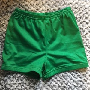 Green cheerleading spanks.